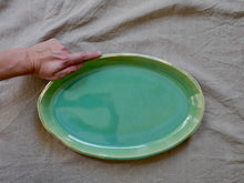 Load image into Gallery viewer, my-hungry-valentine-ceramics-studio-dish-serving-oval-bg-celadon-green-top-hand
